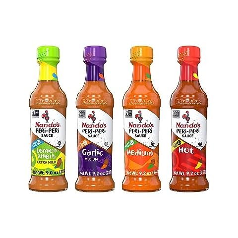 Nando's PERi-PERi Hot Sauce Variety Gift Pack - Medium, Hot, Garlic, Lemon & Herb Piri Piri Sauces | Flavorful Hot Sauce Gift Set Box | Great as Wing Sauces! Gluten Free - 9.1 oz (4 Pack) Cover