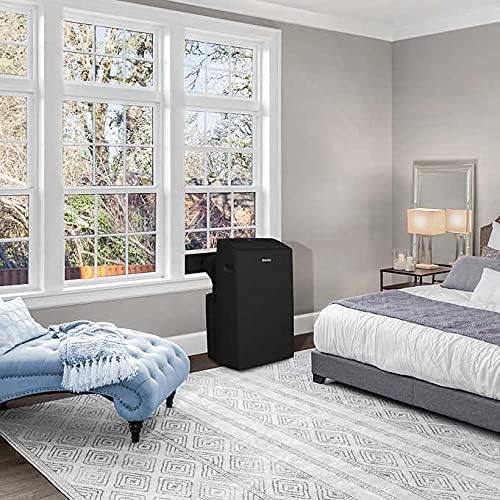 Danby Portable Air Conditioner installed in a room next to a window