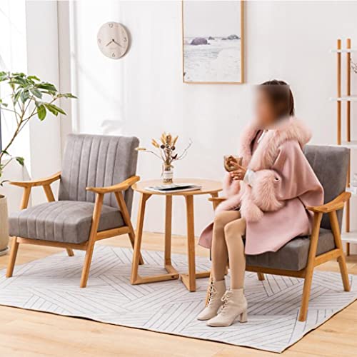 Poltrona moderna imbottita con struttura in legno e comodo cuscino in tessuto, ideale per soggiorno, ufficio, camera da letto e area salotto