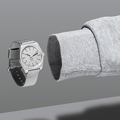 Lexon Scout Watch on a wrist, showing the grey nylon strap and silver case.