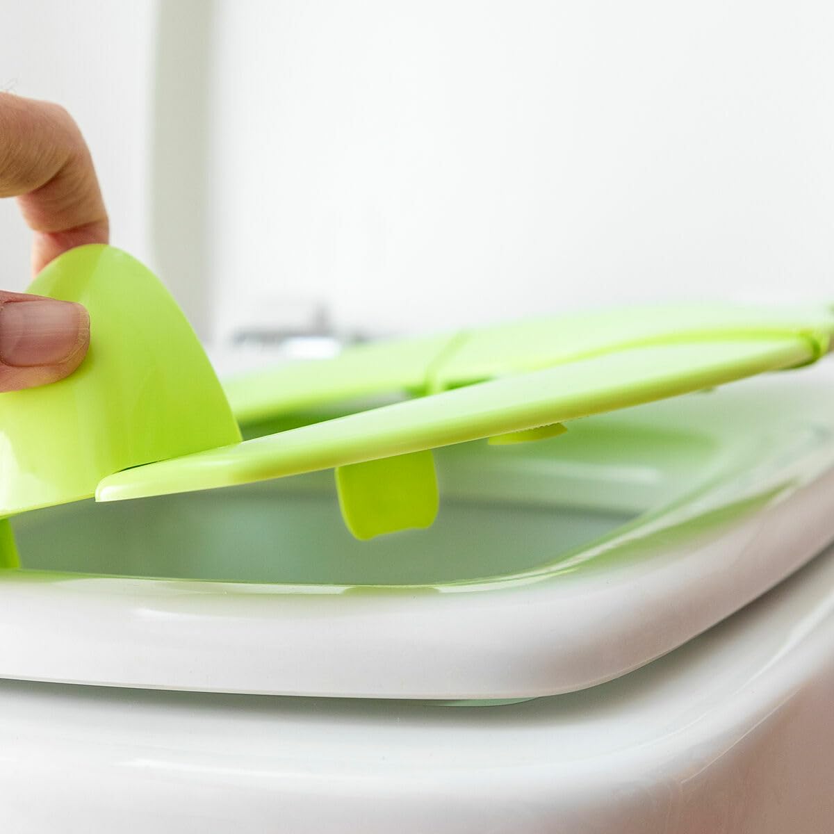 InnovaGoods® Adaptateur de siège de toilette pour enfants, siège de toilette pour enfants pliable avec base antidérapante, peu encombrant, siège de bébé portable, facile à nettoyer et à transporter.