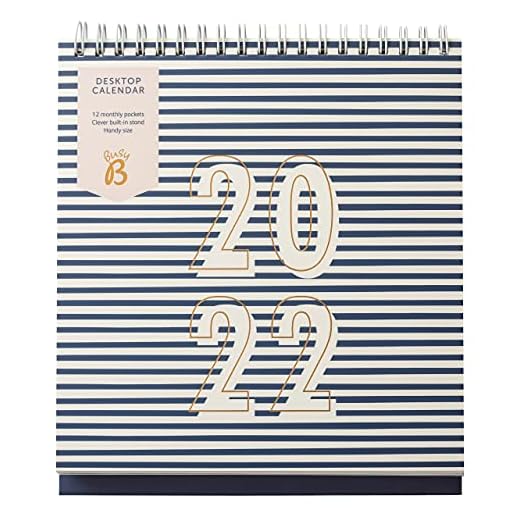 Busy B - Calendario de escritorio de enero a diciembre de 2023 - Planificador de rayas azul marino, con bolsillos y soporte incorporado. Perfecto para la organización de la oficina y el escritorio