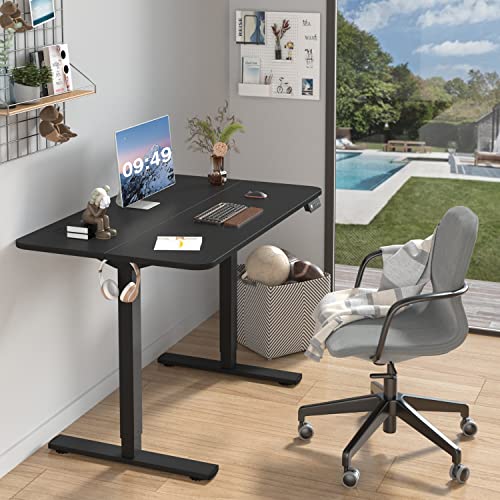 Furmax - Escritorio eléctrico de altura ajustable de pie grande de 48 x 24 pulgadas, escritorio de pie para oficina en casa, alturas prestablecidas, soporte de metal en forma de T, color negro