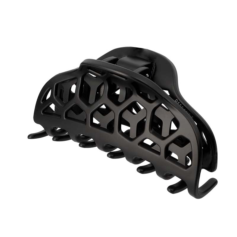 Grande pince a cheveux DESSANGE noir mat au design nid d'abeille unique