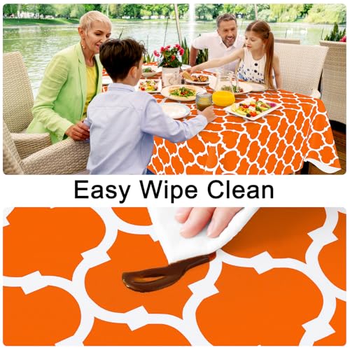 Image of Smiry Rectangle Tablecloth, Waterproof Vinyl Tablecloths with Flannel Backing for Rectangle Tables, Wipeable Spillproof Plastic Tablecloth for Dining, Indoor and Outdoor 60 inch x 84 inch, Bright Orange