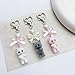 Misovela Cute Fuzzy Cat Keychain Y2K Aesthetic Kawaii Pink White Cat Lovers Decor Gifts Heart Bow Pendent Bag Charm (Black)