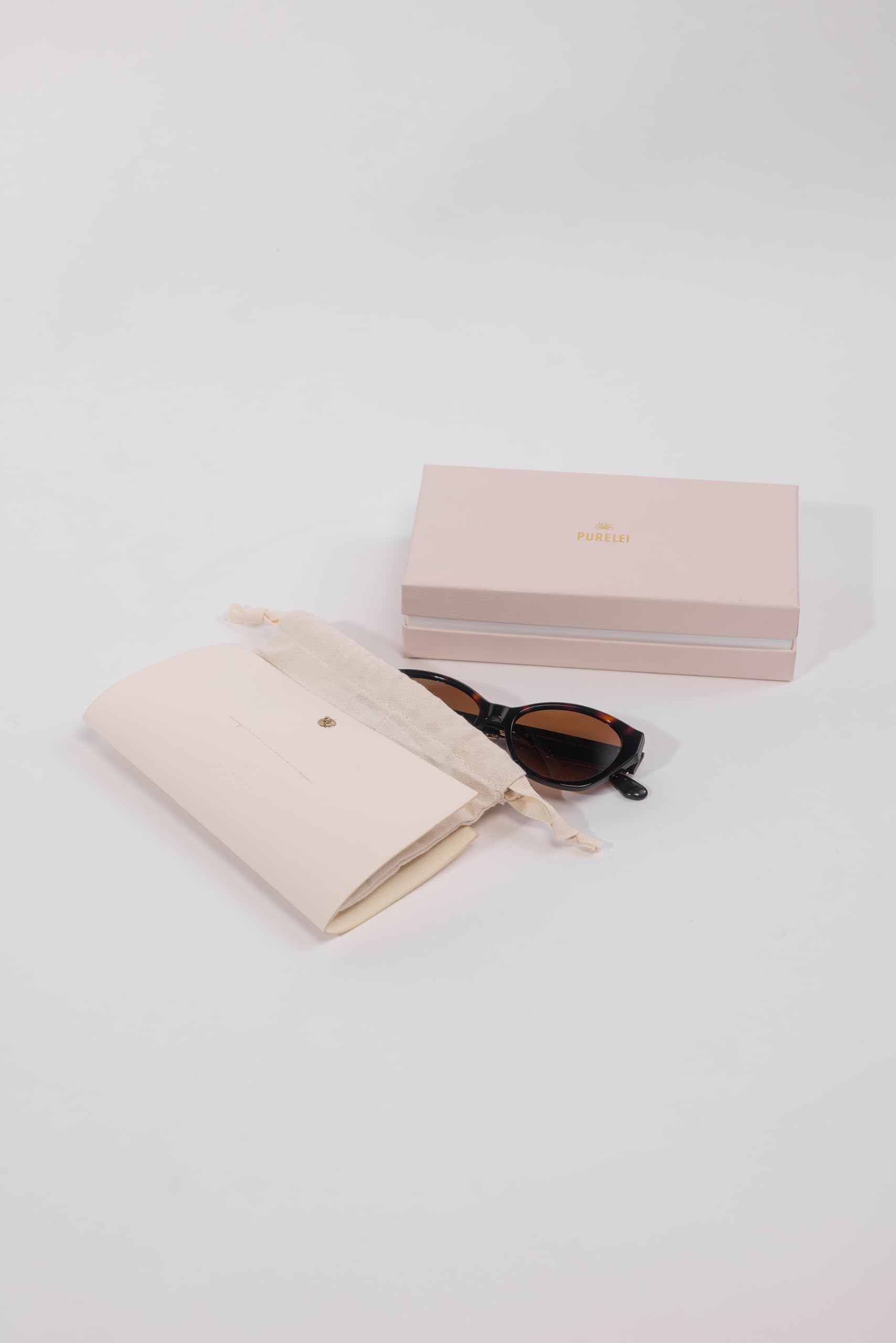 Purelei Sonnenbrille, Modische Sonnenbrille in Schwarz/Gold, UV400 Schutz, Oval/Eckige Form, Acetat/Metall Gestell, Inklusive Etui, Geschenk für Frauen