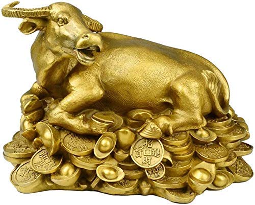 Statue taureau Feng Shui en laiton doré pour une décoration intérieure chic et raffinée