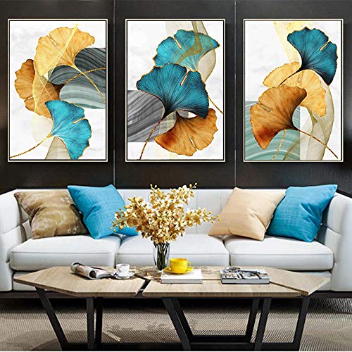 Tableaux ginkgo sur toile pour habiller un mur vide avec un décor moderne bleu et or sans cadre