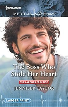 Mass Market Paperback The Boss Who Stole Her Heart [Large Print] Book
