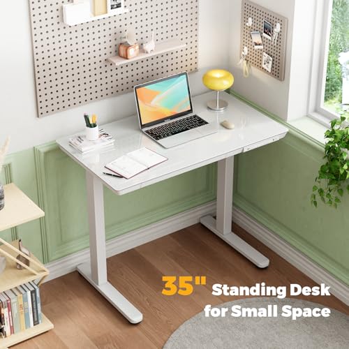 Glass Small Standing Desk with Drawer, 35" x 20" Whole Piece Electric Sit Stand Table, Height Adjustable Desk with Storage & USB Ports, Quick Install Home Office Computer Desk, White