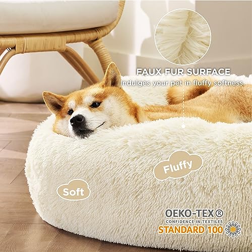 Image of Bedsure Calming Dog Bed for Medium Dogs - Donut Washable Medium Pet Bed, Anti-Slip Round Fluffy Plush Faux Fur Cat Bed, Fits up to 45 lbs Pets, Ivory Beige, 30 inches