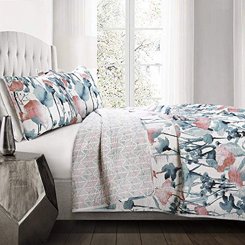 Evite un dormitorio apagado con el juego de ropa de cama reversible de flores azul 4