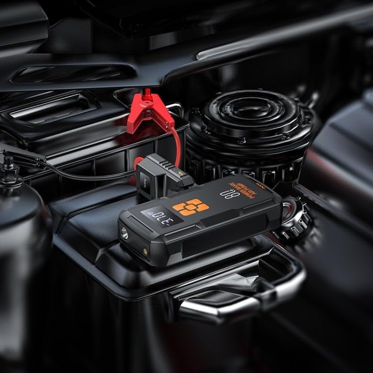 Hoco QS2 connected to a car battery with jump start cables, ready to start the vehicle.