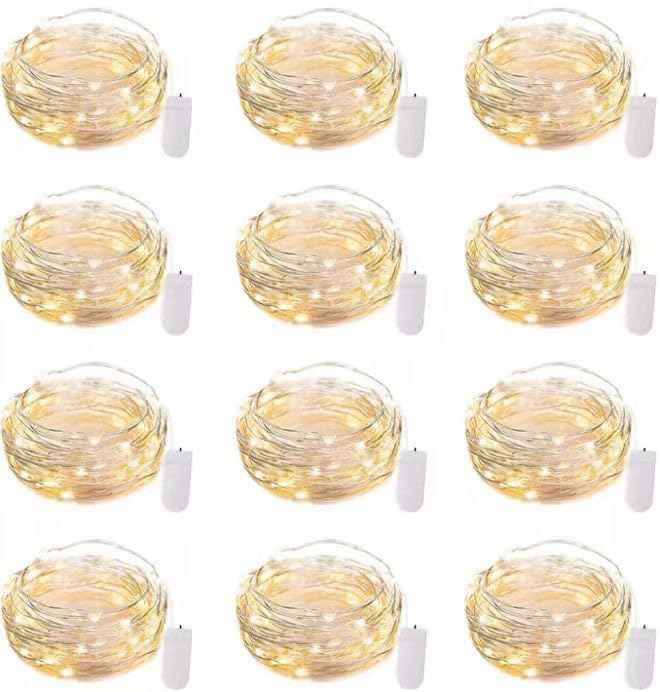 Sponsored Ad – 12 Pack LED Fairy Lights Battery Operated String Lights - 7ft 20LED Waterproof Silver Wire Firefly Starry Moon Lights for DIY Crafts Wedding Table Centerpieces Party Bedroom Christmas.