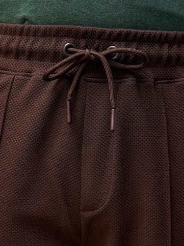 Image of Bewakoof Men's Solid Regular Fit Cotton Blend Track Pants