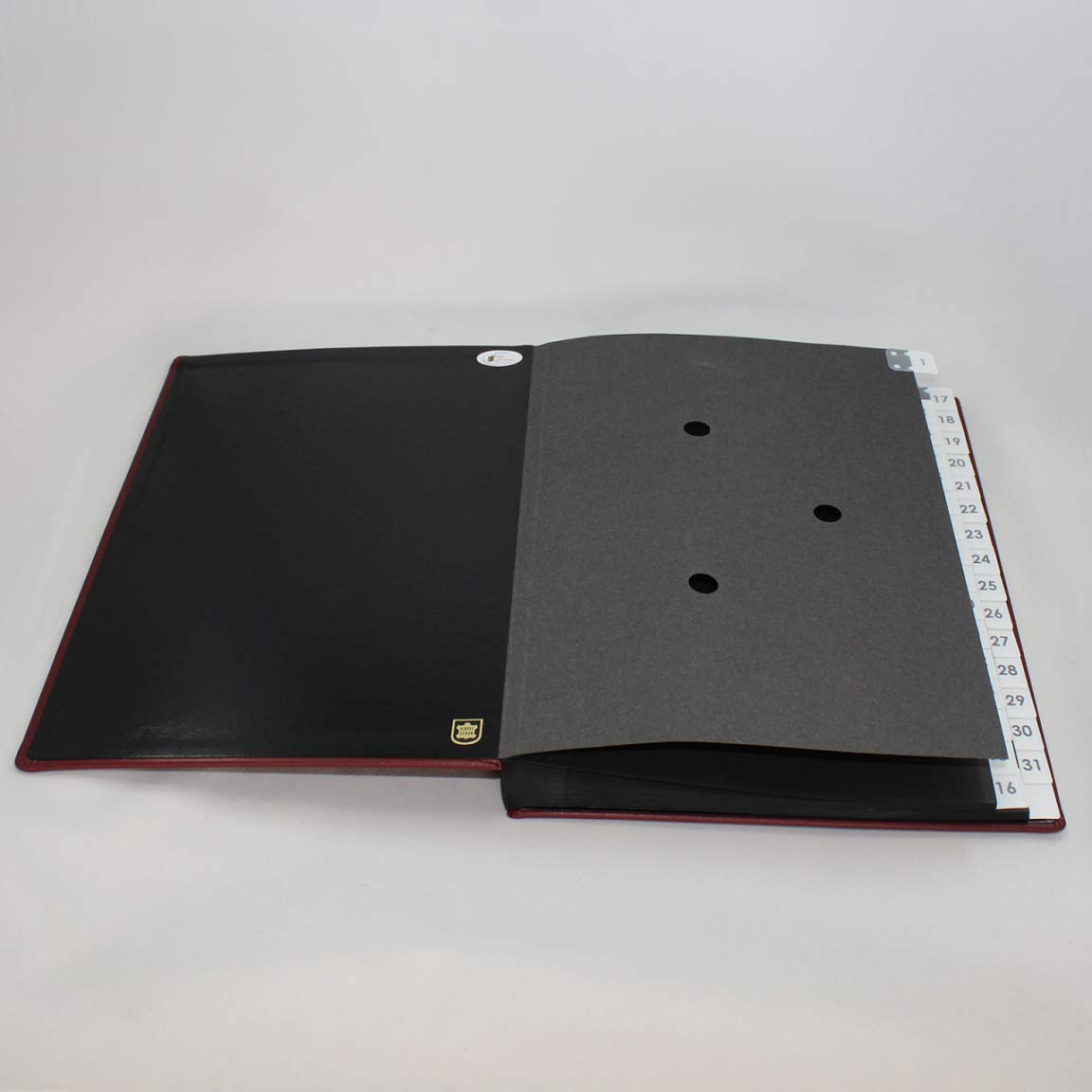 Carpeta clasificadora con registro 1-31 de piel de vacuno lisa en color rojo vino