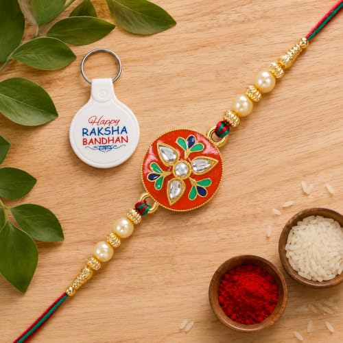 Image of Riddhika Ventures Alluring Gold Plated Floral and Pearl Rakhi (Bracelet) with Roli Chawal, Greeting Card and One Motivational Keychain