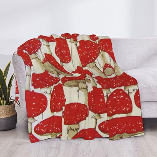 Plaid champignon rouge et blanc pour soirées cocooning sur le sofa