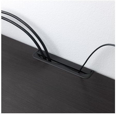 Close-up of the top cable management opening on Ikea BESTA TV unit.