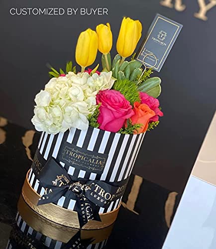 Boîtes cylindriques fleuriste pour décorer vos tables de mariage