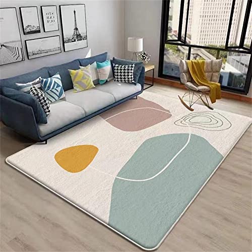 Tapis de salon géométrique multicolore pour un intérieur moderne et design épuré