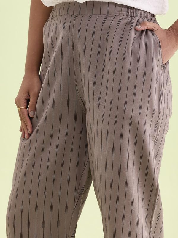 Image of GO COLORS Ikat Print Beige Printed Pencil Pant for Women | Breathable, Side Pocket