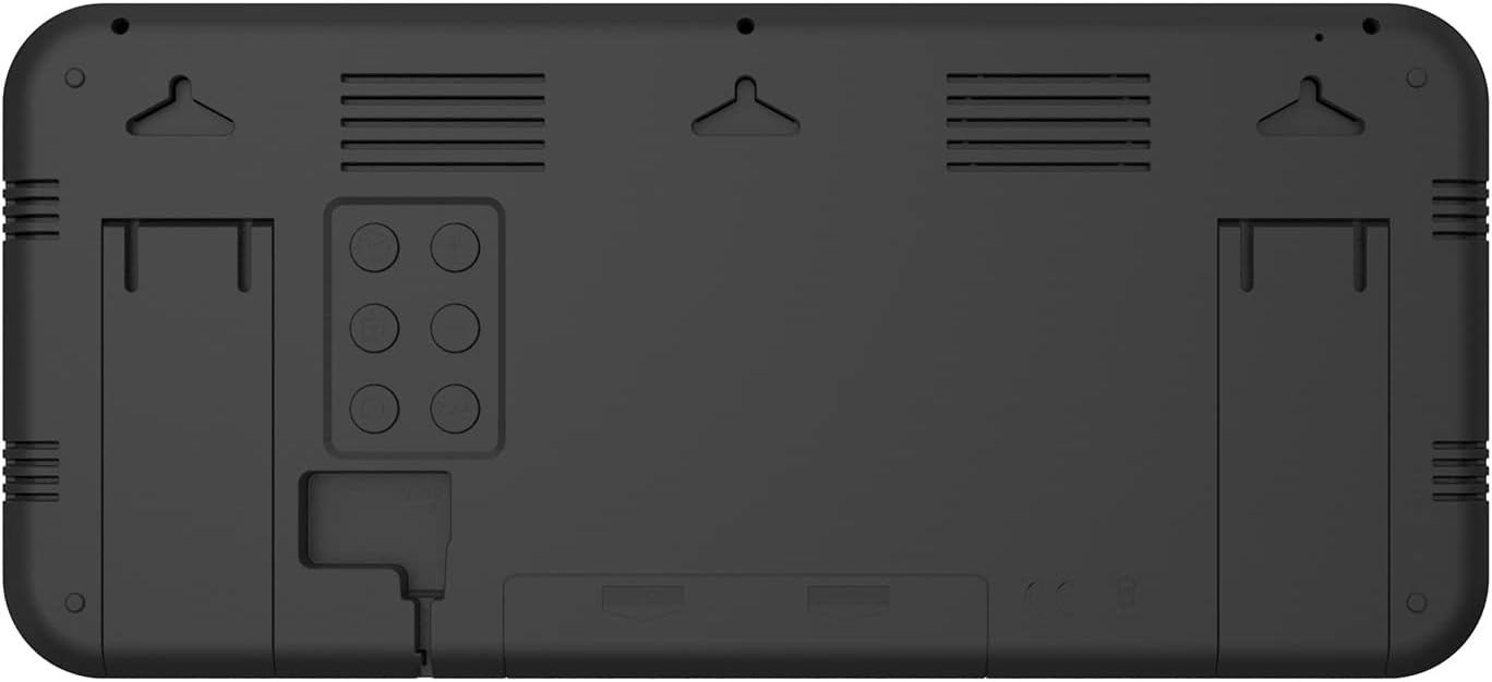 Back of the Green Blue GB214 Digital Wall Clock showing keyhole slots for wall mounting and the battery compartment