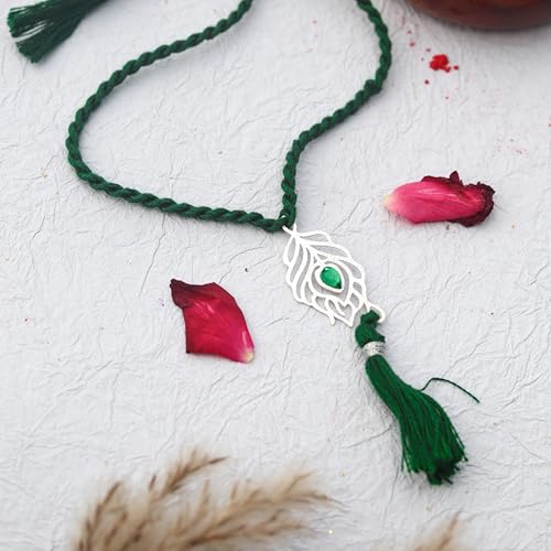 Image of 925 Sterling Silver Peacock Feather with Green Stone Rakhi for Bhai Cotton Thread | Rakshabandhan Rakhi With Greeting Card & Roli Chawal and Certificate of Authenticity