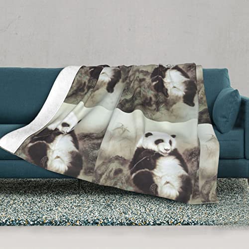 Couverture thermique douce panda contre le froid sur le canapé - 3