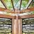 Backyard Discovery Tuscany Cabana Pergola with Bamboo Privacy Panels and Conversation Seating in Pumice