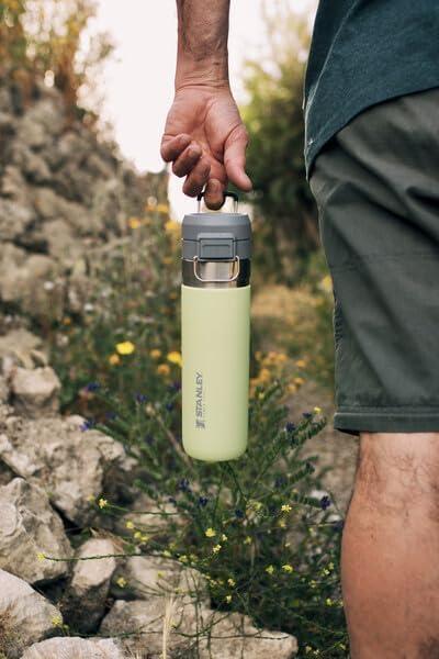 Image of STANLEY Quick Flip GO Bottle, 24 oz, Blue Sky | Push Button Lid | Packable for Travel and Sports | Leakproof Water Bottle | Insulated Stainless Steel | BPA-Free
