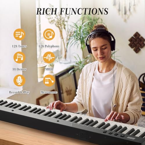 Image of 88 Key Weighted Folding Keyboard,Full Size Electric Piano Keyboard 88 Keys with for Beginners,Portable Case,Sustain Pedal,Black and White,Digital Piano Carry Bag,Note Sticker,Holder,Headphone
