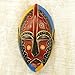 NOVICA Artisan Handcarved African Wood Mask Wooden Igbo Brown Black Yellow Blue Ghana Masks [9.75in H x 5.25in W x 2.4in D] ' Uzoma'