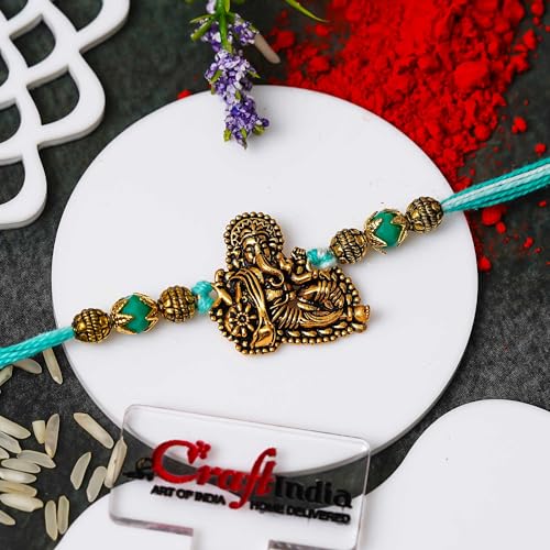 Image of eCraftIndia Golden Lord Ganesha Designer Rakhi for Brother With Gift Combo Set | Raksha Bandhan Rakhi for Bhai Bhaiya | Best Bro Ever Fridge Magnet | Roli Chawal Pack