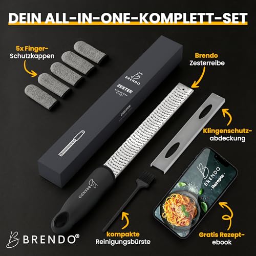 Foto von Brendo Premium Zester Reibe I Käsereibe Schwarz I Edelstahlklinge I Knoblauchreibe, Muskatnuss Reibe, Zitronenreibe, Ingwerreibe, Parmesanreibe I Fingerschutz, Schutzhülle & Reinigungsbürste