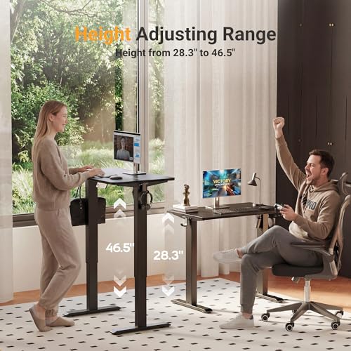 Image of YDN 35 inch Small Electric Standing Desk Adjustable Height, Sit Stand up Desk with Memory Presets & Cable Management, Home Office Desk for Office & Computer Workstation, Black Frame /Black Top