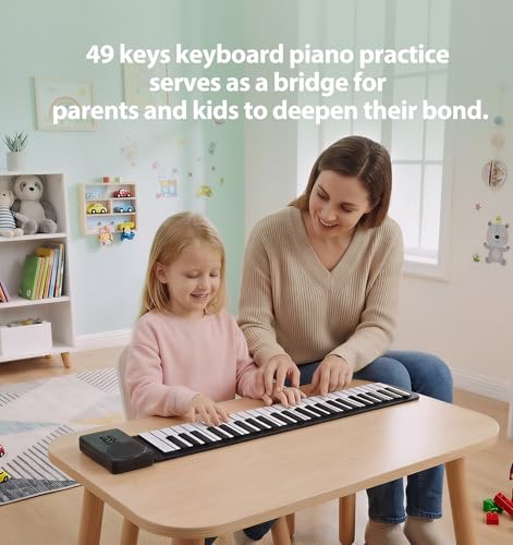 Image of MARVTOWN 49Key Roll Up Digital Piano Keyboard,Portable Foldable Electronic Piano with speaker,earphones,8 Tones,6 Demo Songs,Rechargeable Flexible musical keyboard for Beginners&Kids(Black&White)