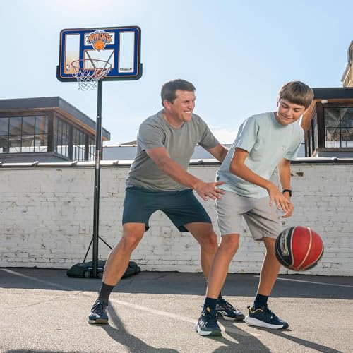 Image of Lifetime NBA New York Knicks Portable Basketball Hoop, Adjustable Height 7.5-10 Ft, 44 Inch Shatterproof Fusion Backboard, Base with Wheels