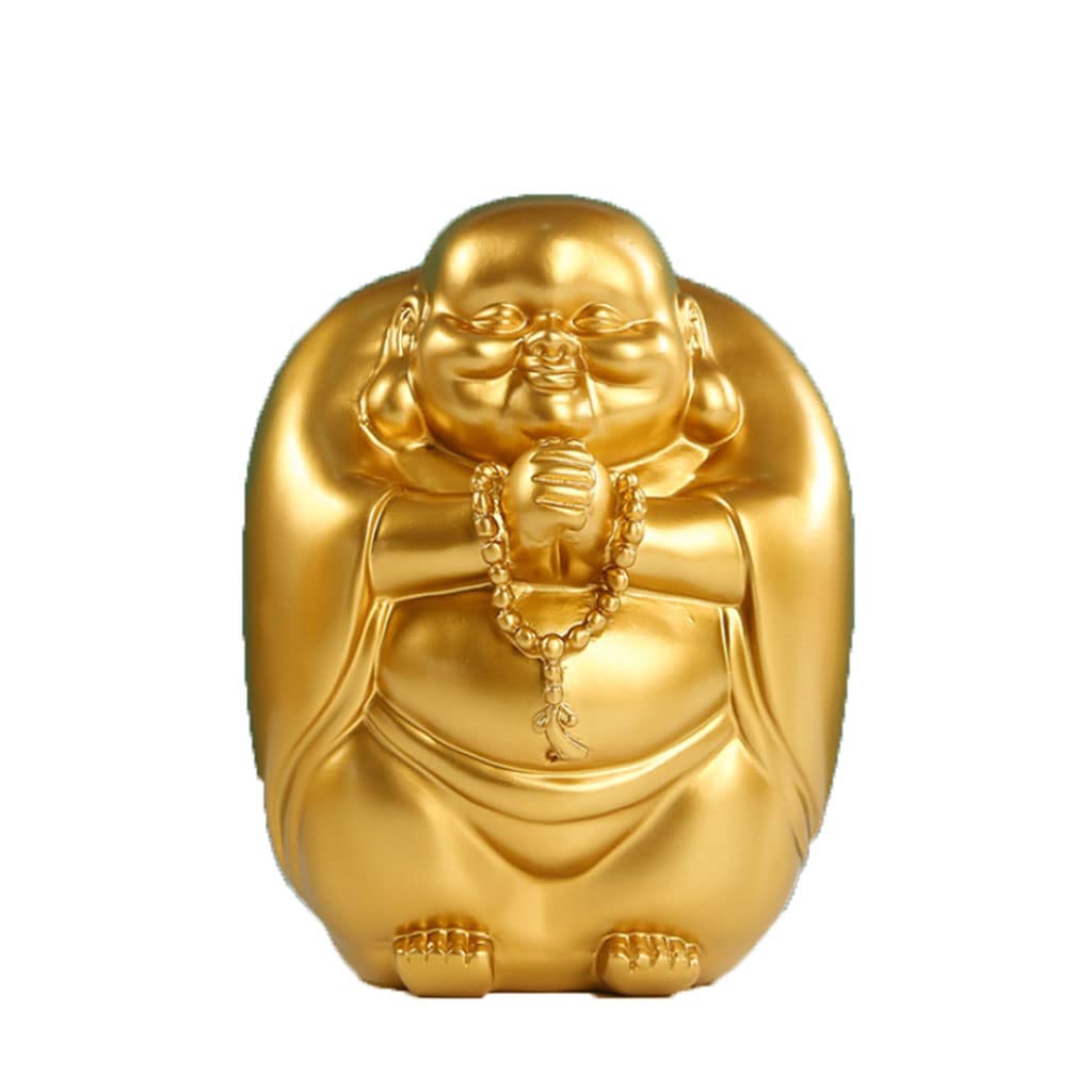 透かし彫りの悠々たる弥勒仏、家の机の上に贈り物の箱