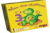 Wer an der Reihe ist, versucht, durch Umdrehen von Plättchen ein Paar zu finden, das aus einer Zahl und der entsprechenden Menge besteht. Wenn du einen Dinosaurierplättchen zurückkehrst, holst du den Dinosaurier-Spion.