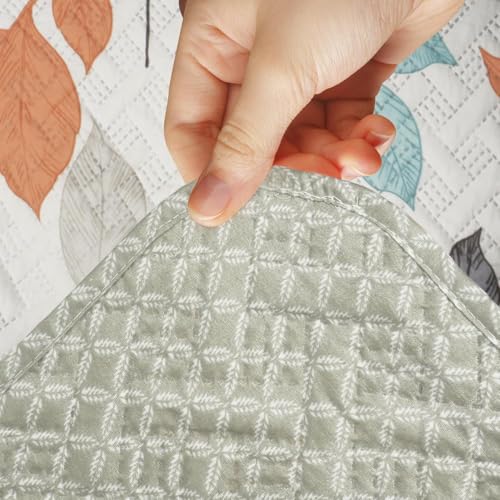 Image of Printed Quilted Sofa Mat for 3 Seater - Floral Design Slipcover with Armrest, Pockets on Both Sides, Fully Covered Sofa Protector - Orange Grey