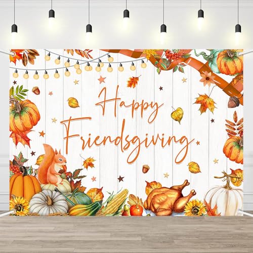 Décorations de fête automne avec feuilles d'érable et citrouille