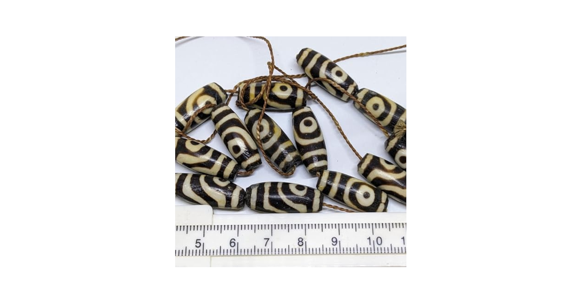西蔵 チベット 朱砂 二眼天珠 ジービーズ Amazon.co.jp: ジービーズサイズ西蔵天珠2眼dzi beadsチベット