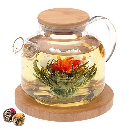 Teabloom Stovetop Safe Glass Teapot with Bamboo Lid (40oz/1200ml) + Loose Leaf Tea Filter Spout + 2 Blooming Teas + Large Bamboo Trivet - Natural Flowering Tea Gift Set