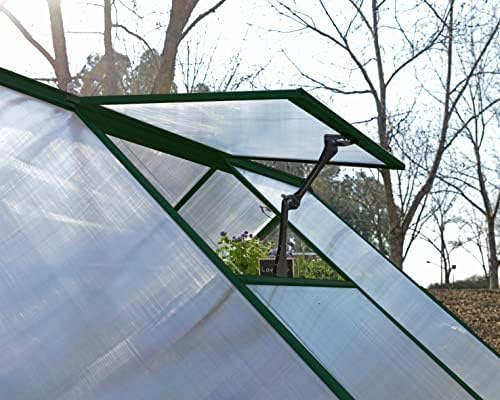 Close-up of a greenhouse roof vent mechanism