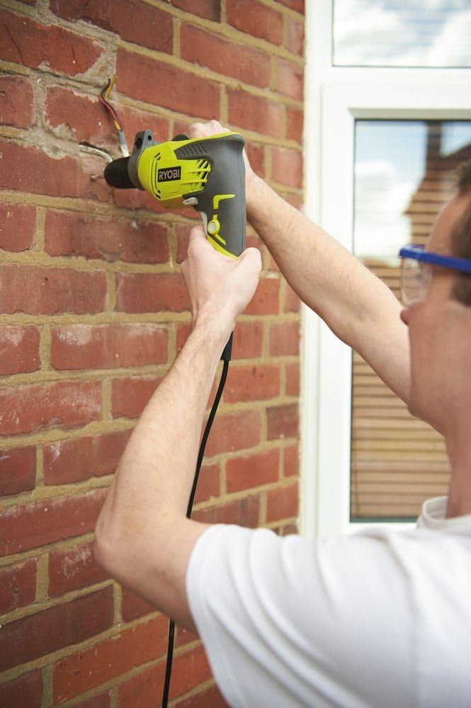 Ryobi RPD500-GC, Trapano a Percussione 500W, Mandrino Autoserrante, Variatore Elettronico di Velocità, 3000 giri/min, Impugnatura GripZone, Compatto e Leggero