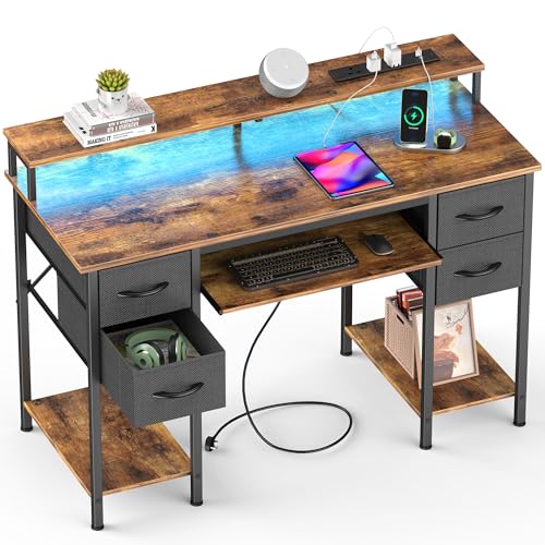 Yornoli Escritorio para computadora de 120 cm con 4 cajones de tela, escritorio para juegos con luces LED y tomas de corriente para espacios pequeños, escritorio de oficina en casa con soporte para