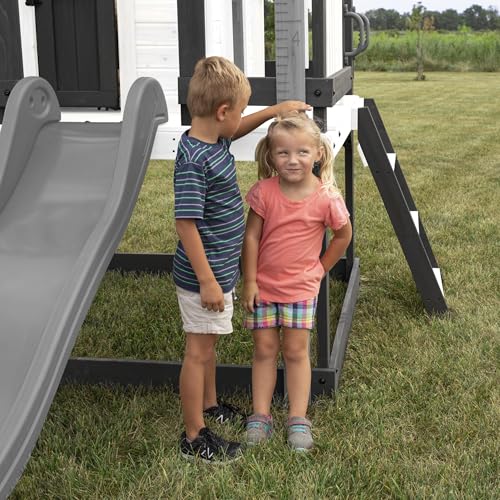 Backyard Discovery Sweetwater Heights White Elevated Cedar Wooden Kids Playhouse with Wave Slide, Play Kitchen, Step Ladder, Half Door, Wrap-Around Deck, Windows, Bell, Growth Chart for Outdoor Play - image 8