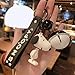 QINNKJIA Snoopy Charlie Bijoux Pendentif Porteclés Pendentif voiture Porteclés Porteaccessoires Pendentif Porteclés Vendu en deux pièces